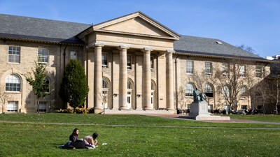 (FILES) Cornell University students sit outside on November 3, 2023 in Ithaca, New York. (AFP)