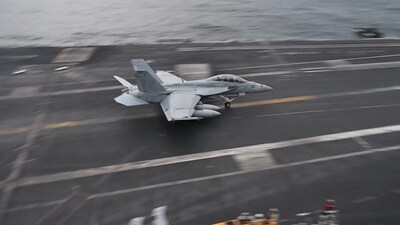 USS George Washington (CVN 73) conducts flight operations while sailing in regional waters in the Middle East. (Credit: US Central Command)