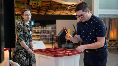 Latvia votes in a parliamentary election shaped by drone incursions, the war in Ukraine and concerns over Russia. Prime Minister Andris Kulbergs is seeking a full term after taking office in May. (Image: AFP)