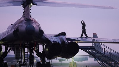 (FILES) A member of the ground crew prepares a USAF B-1 bomber before dawn at RAF Fairford airbase, used by United States Air Force (USAF) personnel, amid the U.S.–Israeli conflict with Iran, in Fairford, Gloucestershire, Britain, March 23, 2026. REUTERS/Toby Shepheard