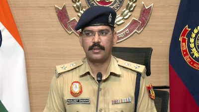 A Delhi Police officer briefing media on Tuesday