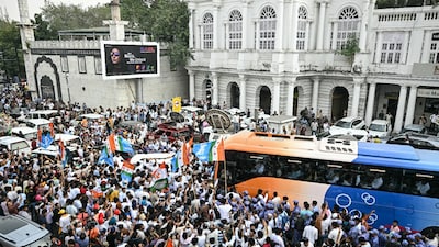 Congress party supporters gather as the INDIA bloc leaders leave in a bus to participate in a protest in New Delhi (AFP/file image)