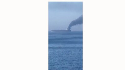 The Iranian Navy announced that an oil tanker violating maritime restrictions caught fire in a restricted area east of the Strait of Hormuz after switching off its tracking systems on Friday. (Credit: Press TV)