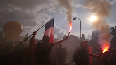 Germany urges citizens to exercise caution after France protests