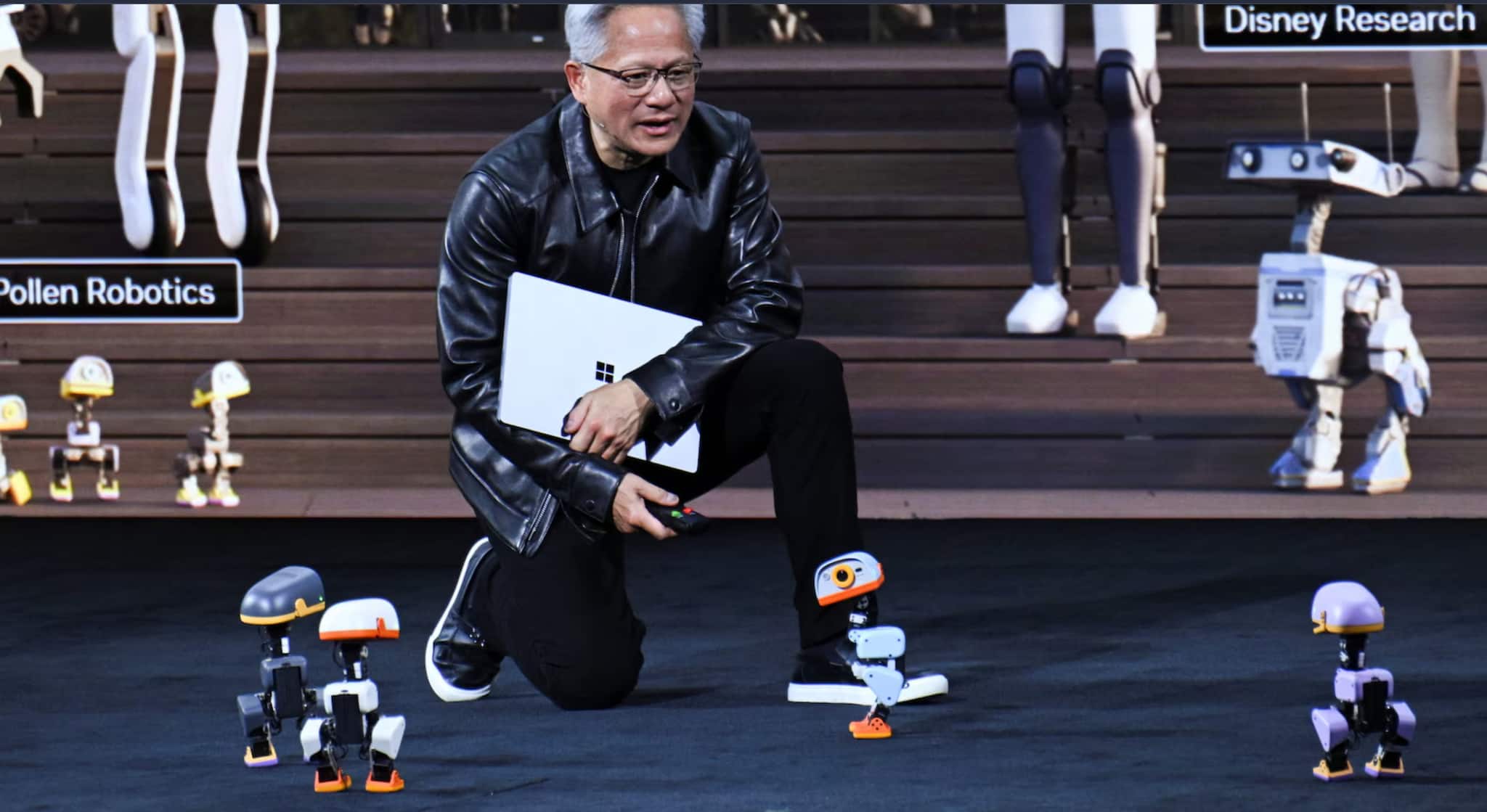 Nvidia CEO Jensen Huang showcases AI-trained Microduck robots at GTC Berlin keynote